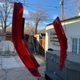 Image for article titled My $2,000 Nissan Leaf Looks Way Better After I Painted The Taillights Red